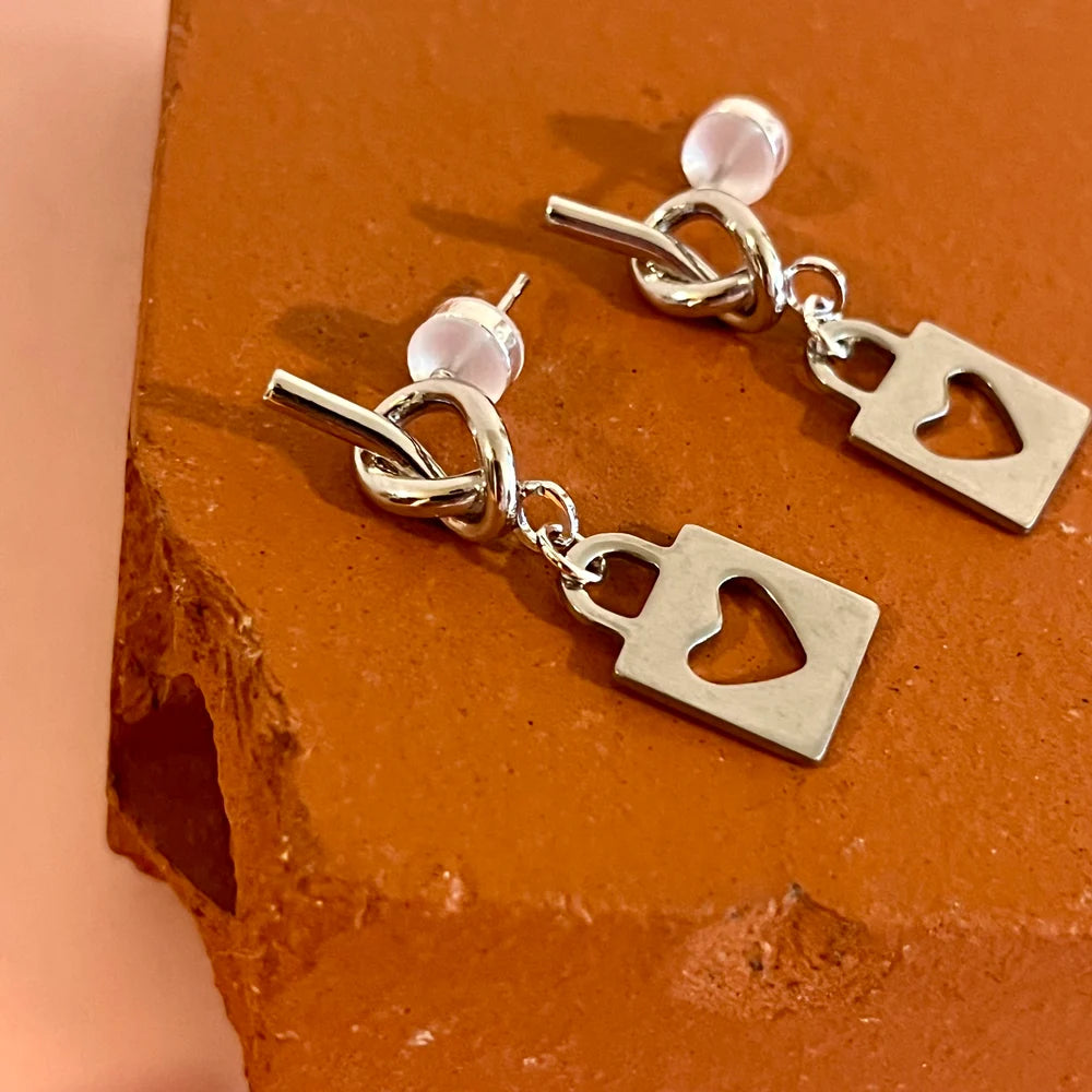 Penny Foggo – Lock & Knot Drops in silver (Fine Thanks)